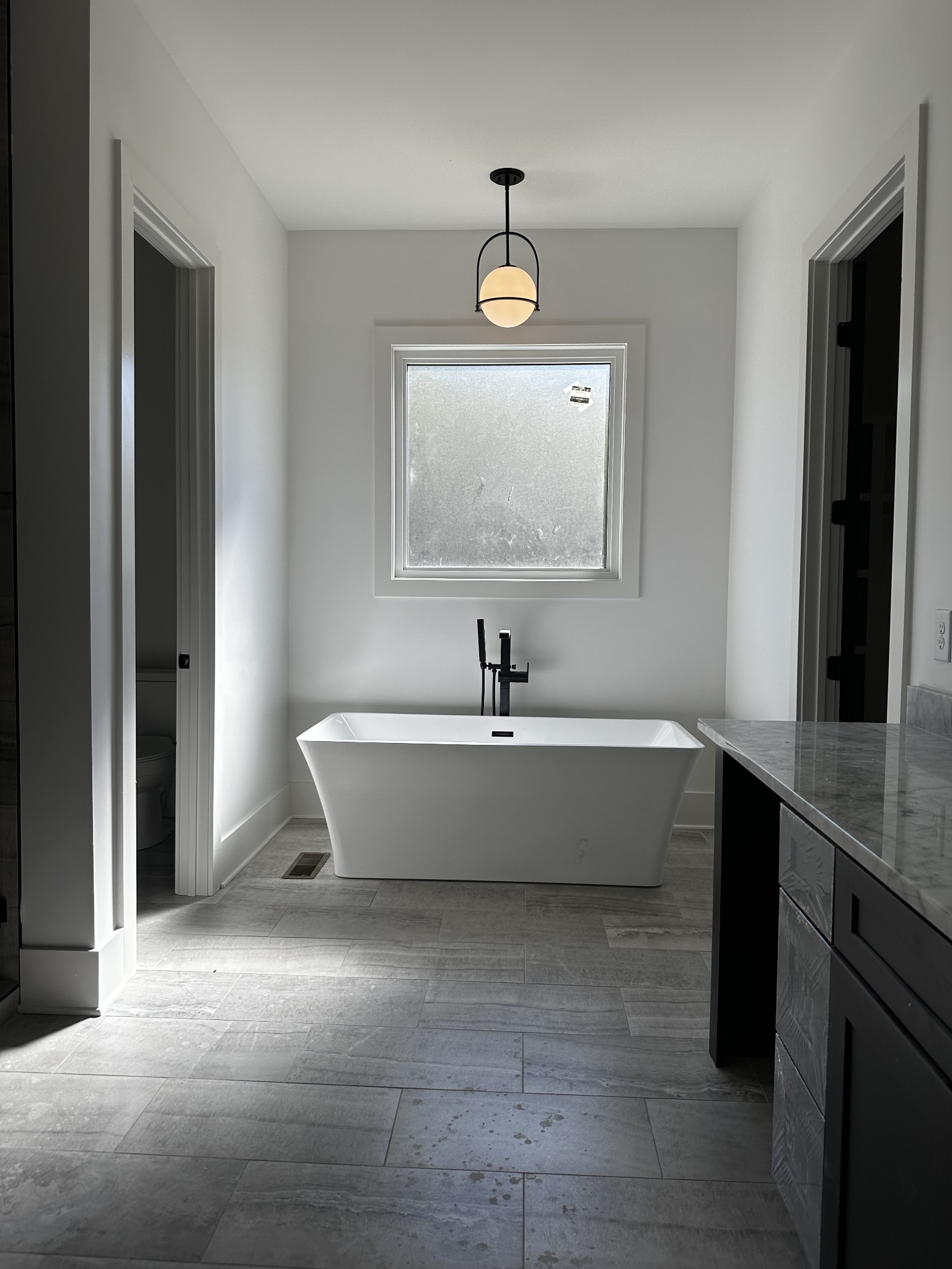 2150 B Philadelphia Lebanon, TN 37087 - Photo 22 of 46 a bathroom with a bathtub and a sink