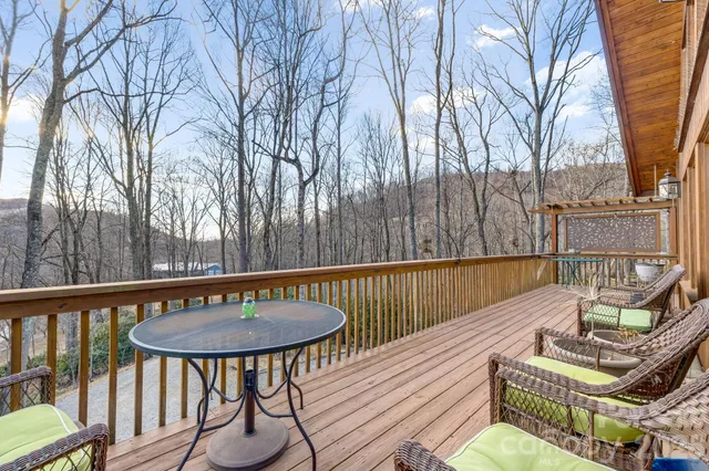 a view of a chairs and table in the patio