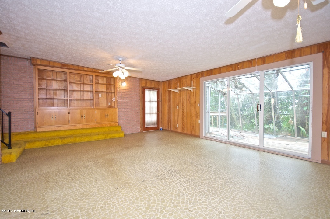 4149 Rogero Road Jacksonville, FL 32277 - Photo 20 of 27 a view of an empty room with a window