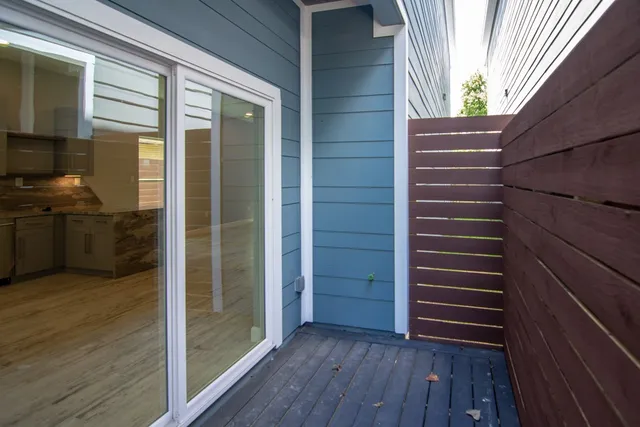 a view of outdoor space and wooden floor