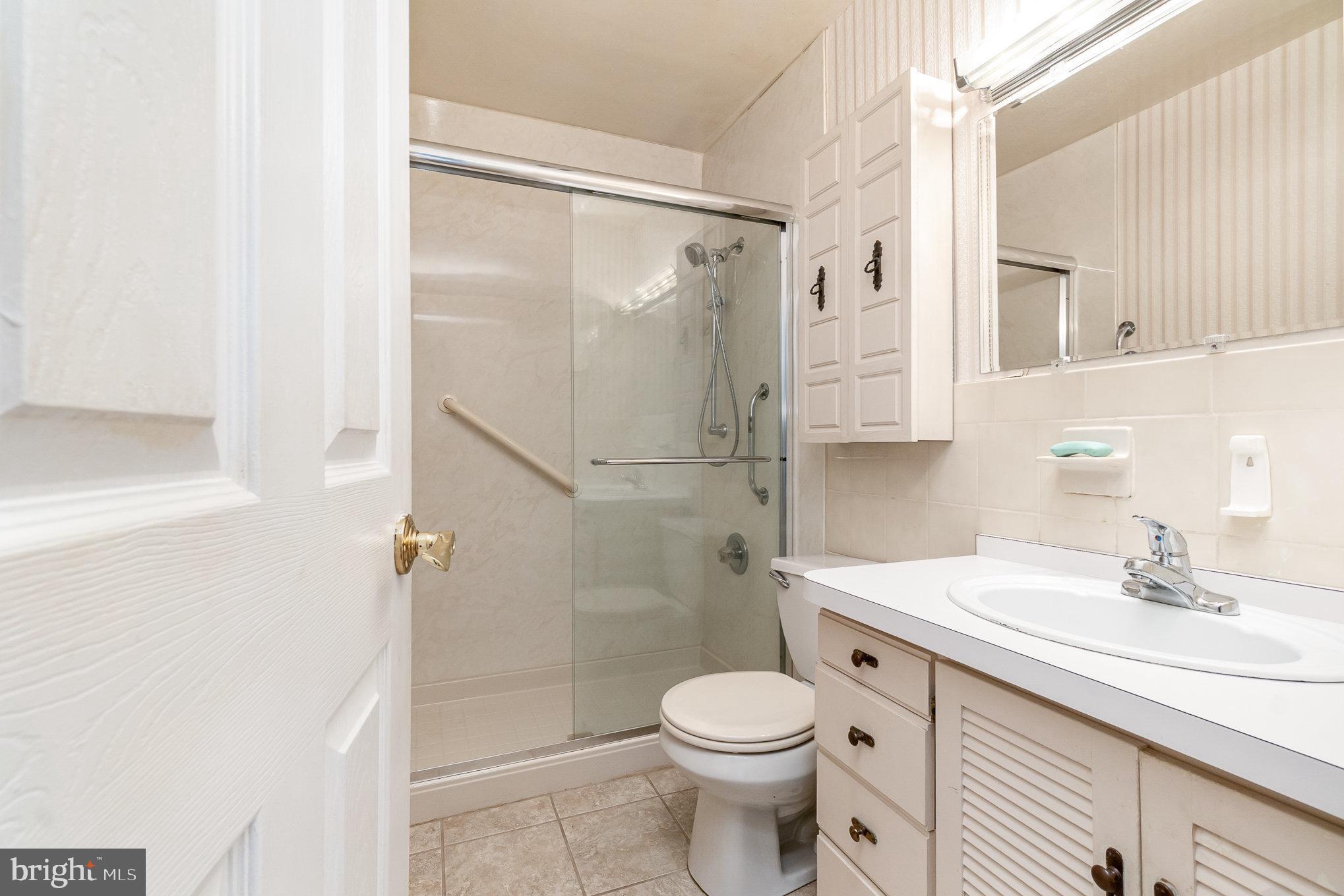 1908 Juniper Road Edgewood, MD 21040 - Photo 22 of 37 a bathroom with a sink a toilet and shower