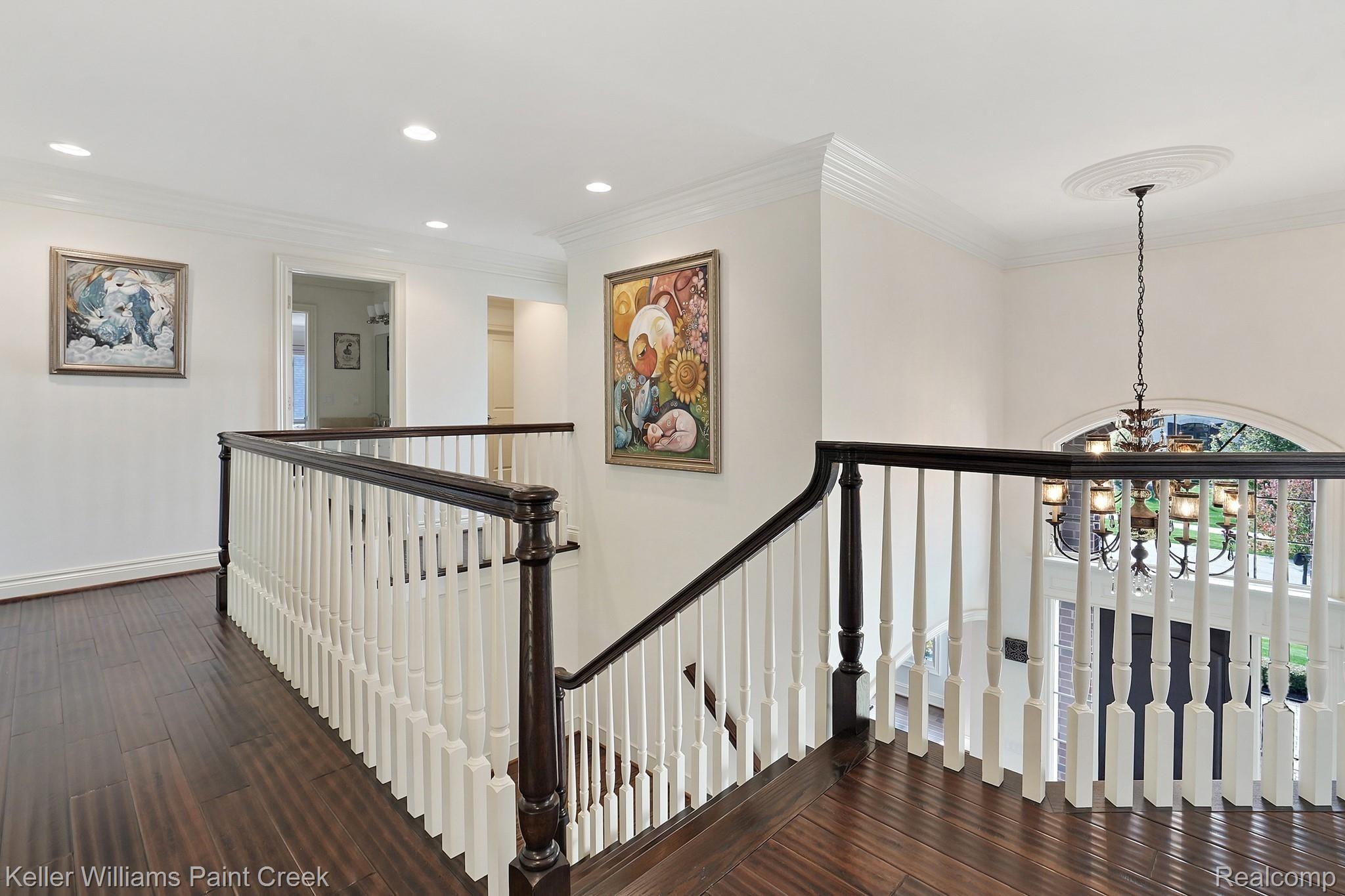 2772 North Addison Circle Rochester, MI 48306 - Photo 37 of 71 Beautiful detailed railings provide open feeling on the upstairs landing