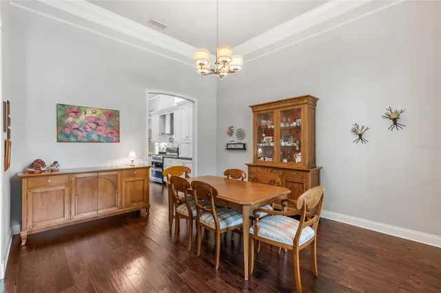 a bedroom with a bed and ceiling fan