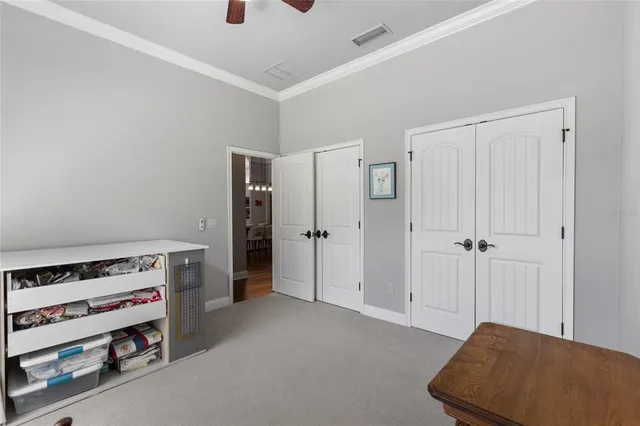 a view of an entryway with table and chairs
