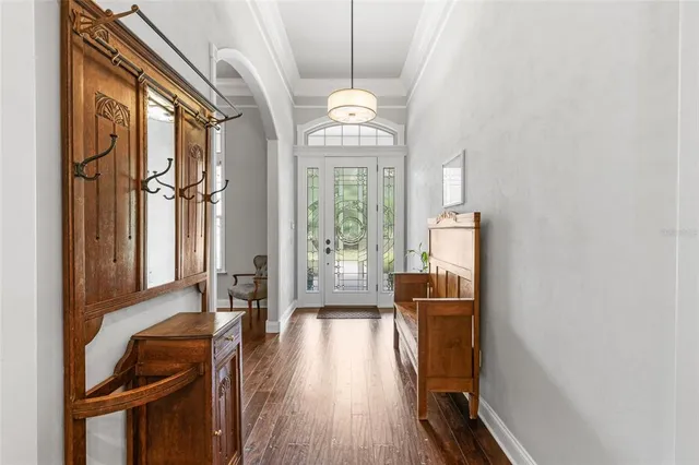 a large kitchen with a table and chairs
