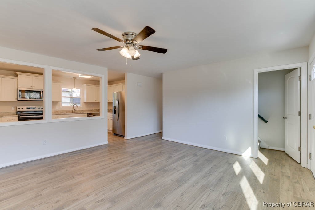 3310 West Weaver Road Hampton, VA 23666 - Photo 9 of 28 a view of a livingroom with a kitchen
