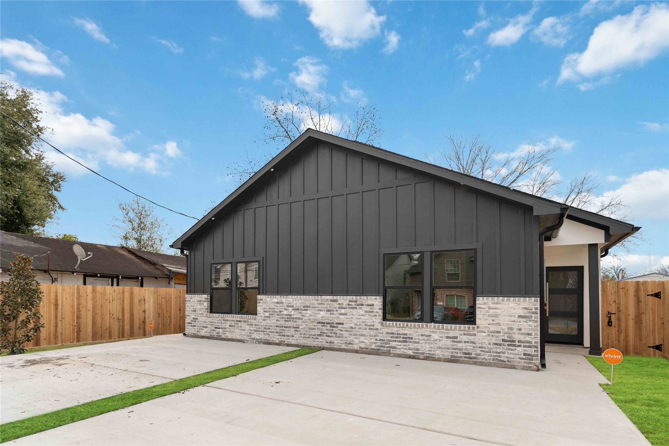 4314 Stassen Street Houston, TX 77051 - Photo 2 of 28 a front view of house with garage and yard