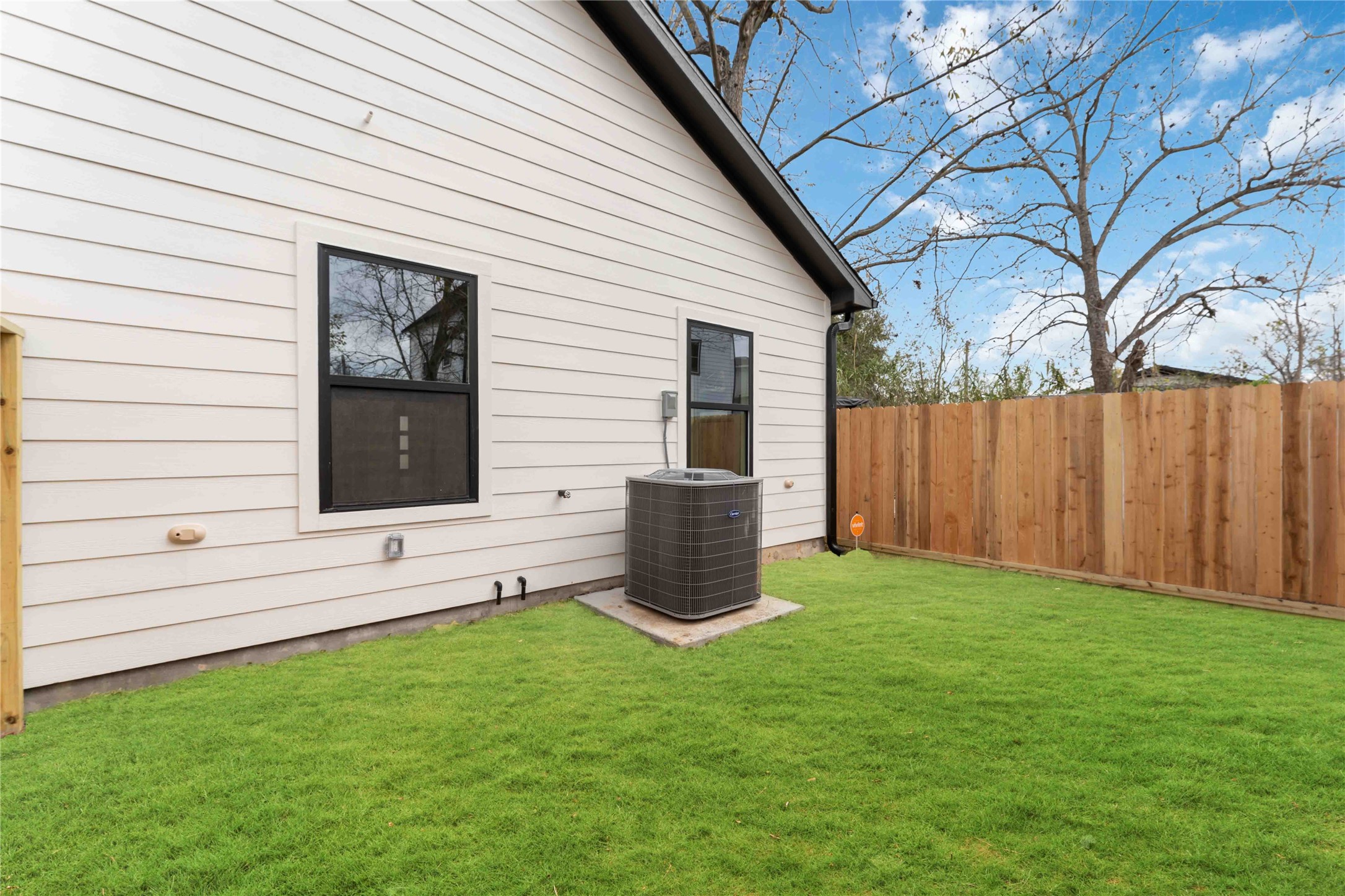 4314 Stassen Street Houston, TX 77051 - Photo 28 of 28 a view of a backyard with potted plants and a large tree