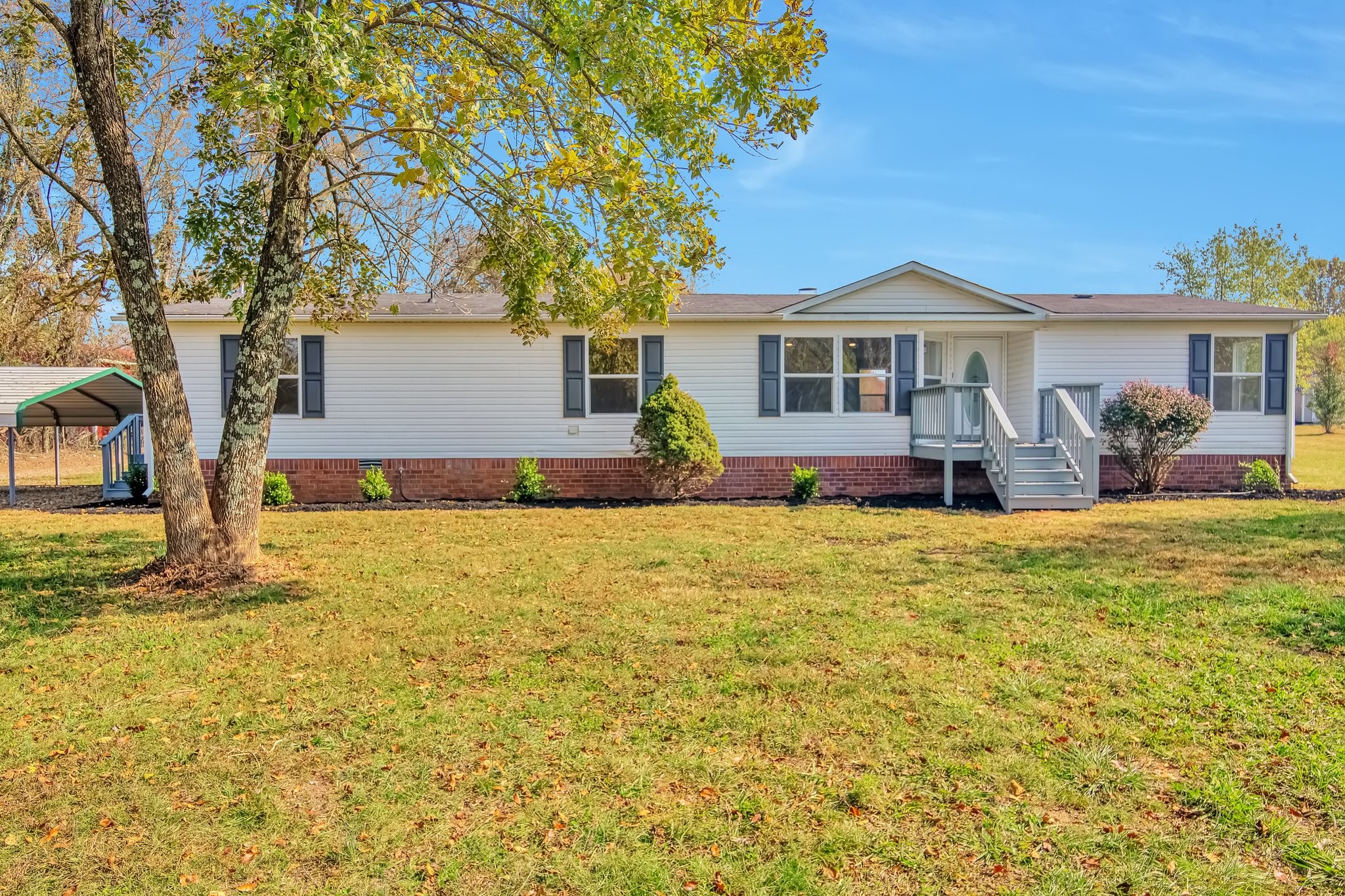 77 Centerville Road Lebanon, TN 37087 - Photo 1 of 22 a front view of a house with patio