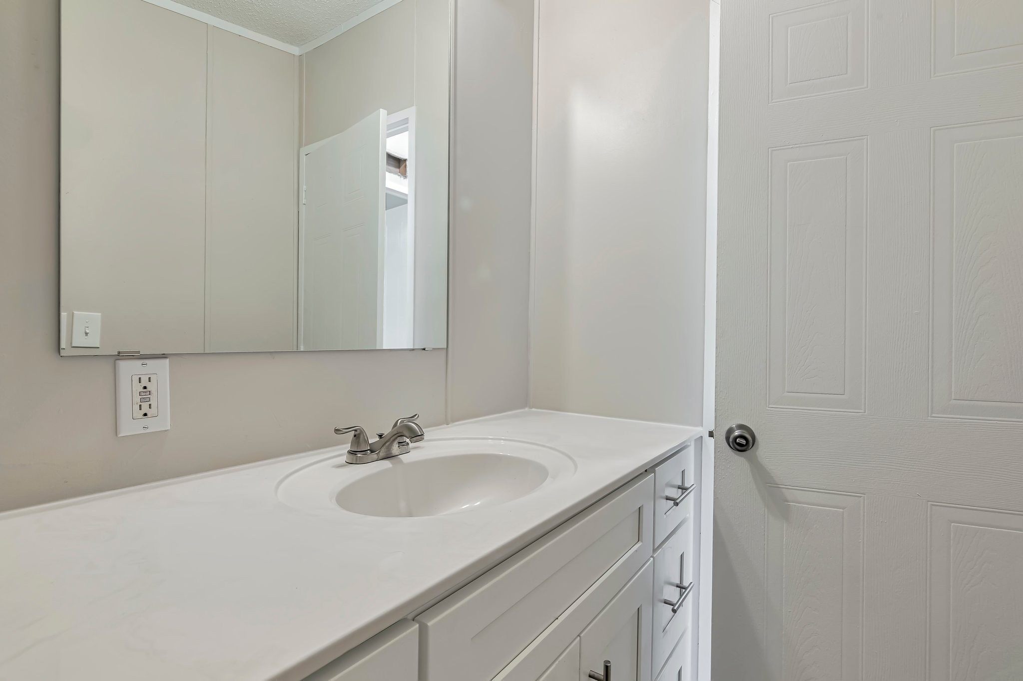 77 Centerville Road Lebanon, TN 37087 - Photo 6 of 22 a bathroom with a sink and a mirror