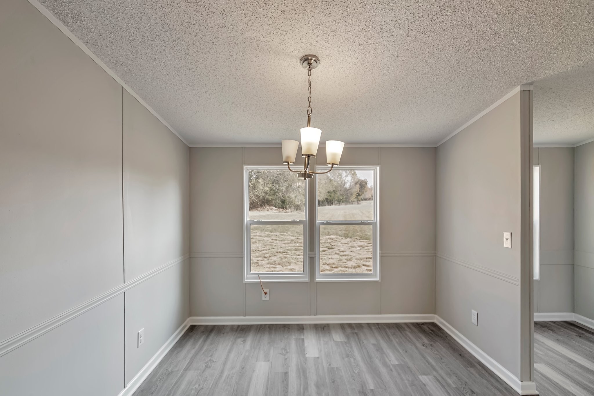 77 Centerville Road Lebanon, TN 37087 - Photo 10 of 22 a room with window and wooden floor