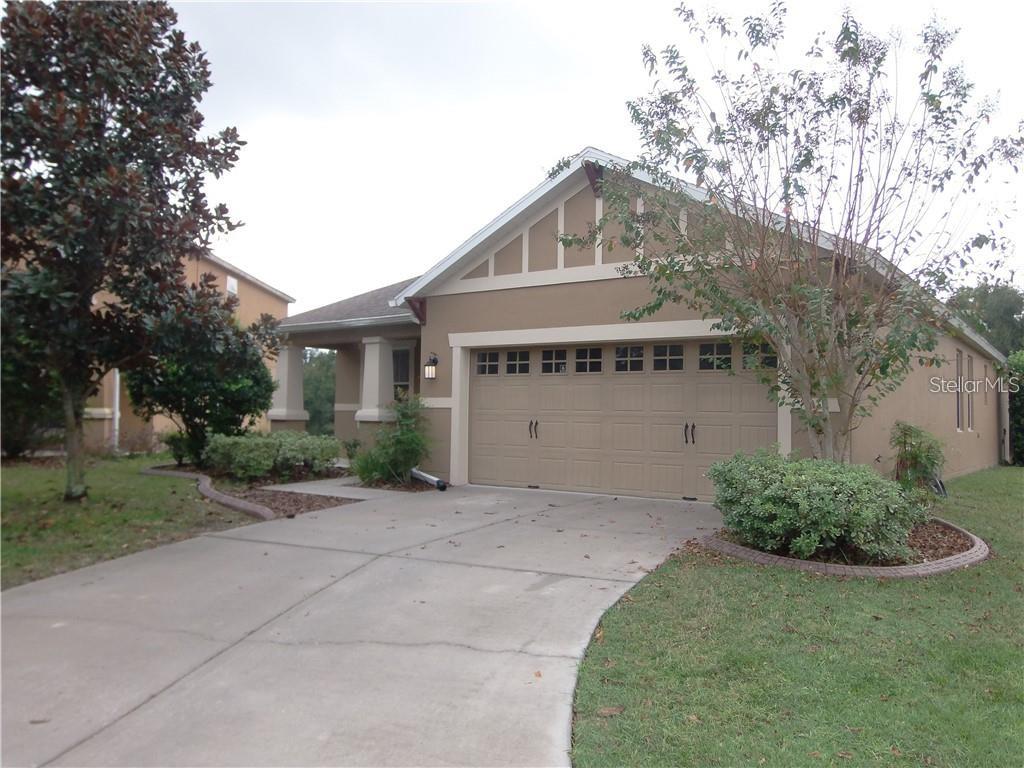 Undisclosed Address Mount Dora, FL 32757 - Photo 1 of 1 FRONT WITH GARAGE