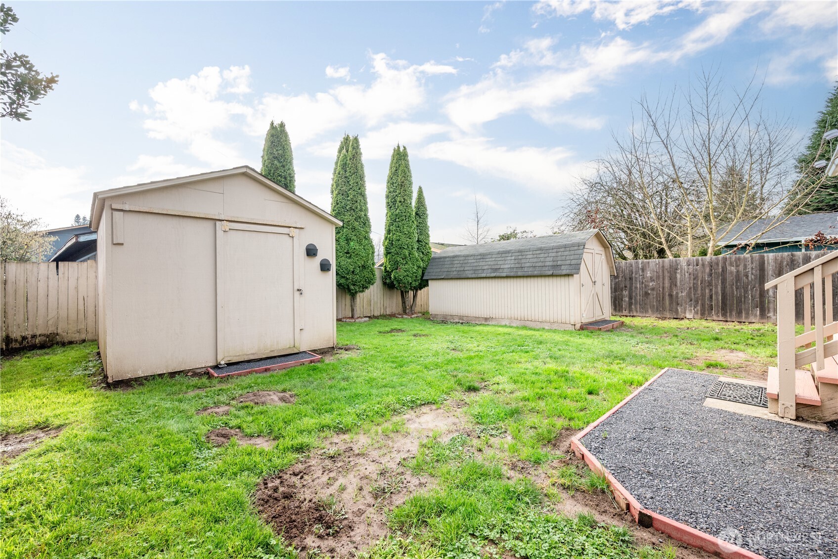 96 Dirk Lane Kelso, WA 98626 - Photo 12 of 13 a view of a backyard with barn and a large tree