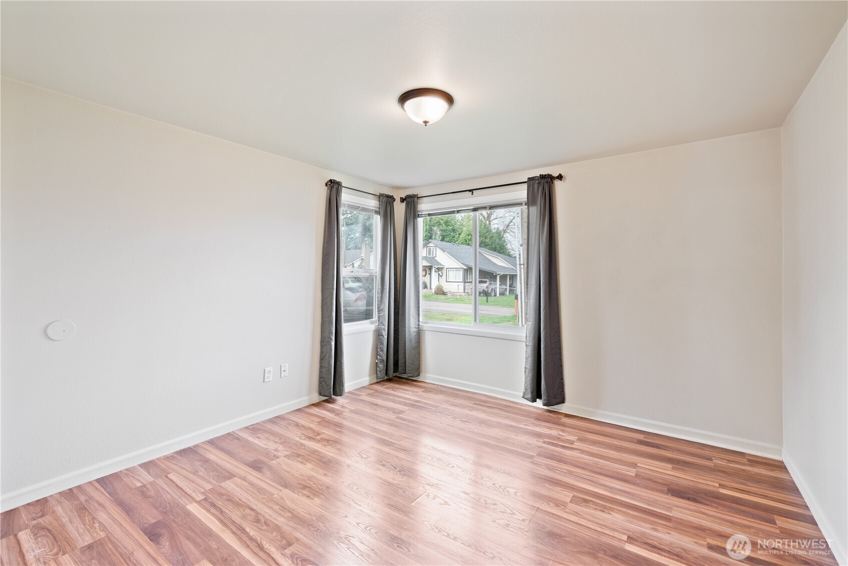 96 Dirk Lane Kelso, WA 98626 - Photo 9 of 13 a view of a livingroom with wooden floor and a window