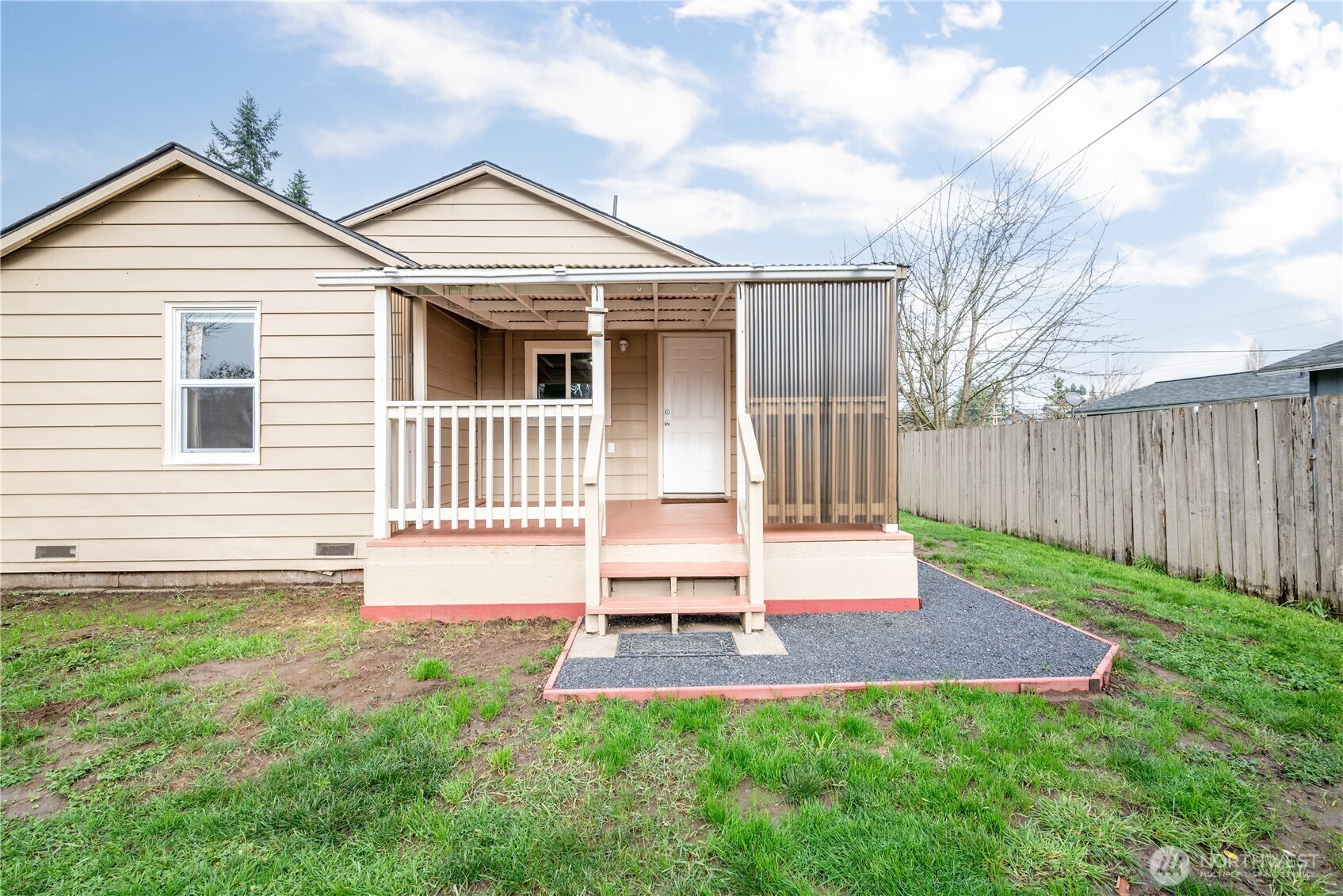 96 Dirk Lane Kelso, WA 98626 - Photo 10 of 13 a front view of a house with a yard and fence
