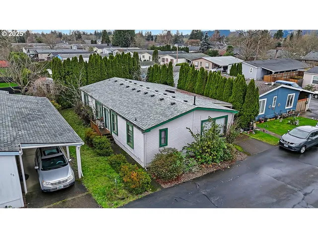 a aerial view of a house with a garden and plants