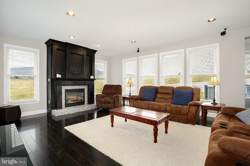 4320 Valley View Road Middletown, MD 21769 - Photo 11 of 30 a living room with furniture flat screen tv and a fireplace