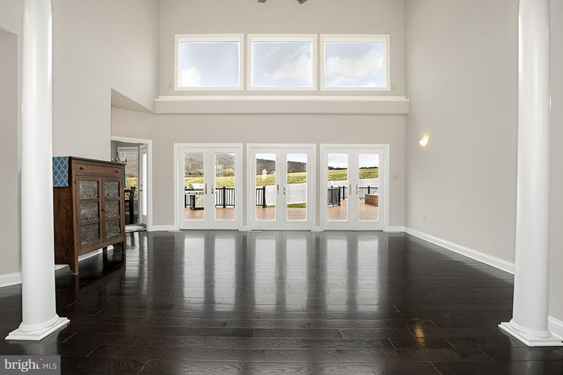 4320 Valley View Road Middletown, MD 21769 - Photo 3 of 30 a view of wooden floor and a window in a room