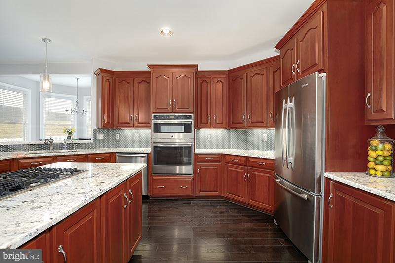 4320 Valley View Road Middletown, MD 21769 - Photo 6 of 30 a kitchen with stainless steel appliances granite countertop a refrigerator a stove and a sink