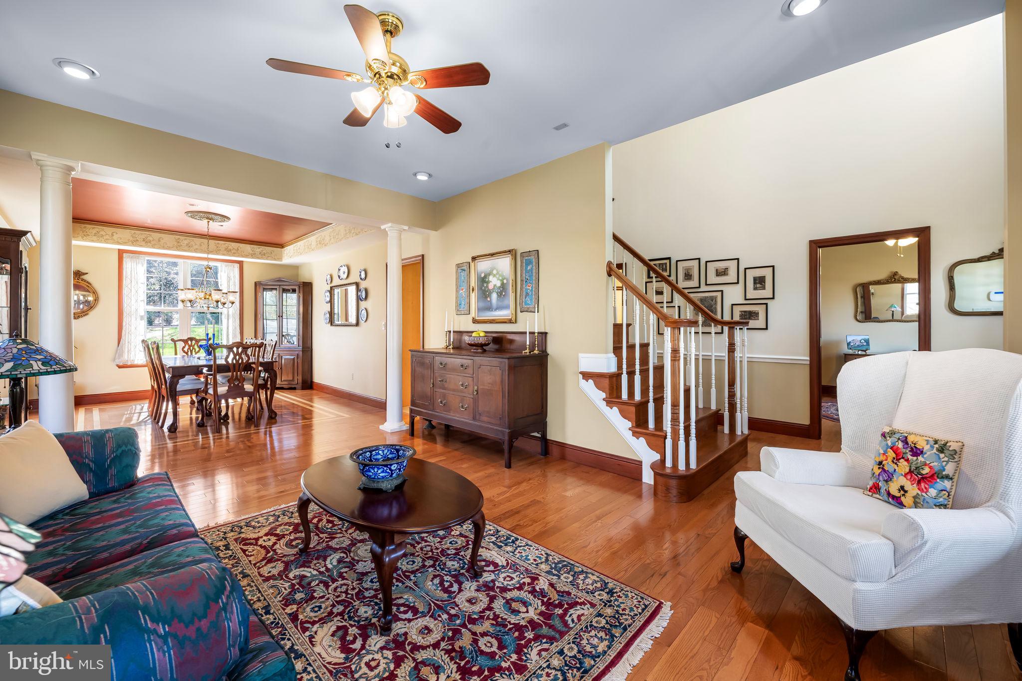 6815 Cherry Tree Court New Market, MD 21774 - Photo 11 of 86 a living room with furniture and a wooden floor