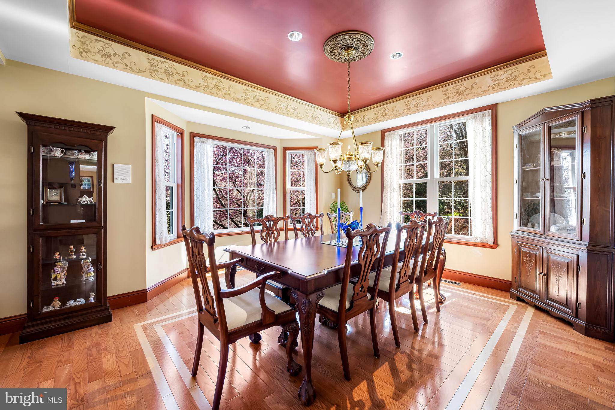 6815 Cherry Tree Court New Market, MD 21774 - Photo 13 of 86 a view of a dining room with furniture window and wooden floor