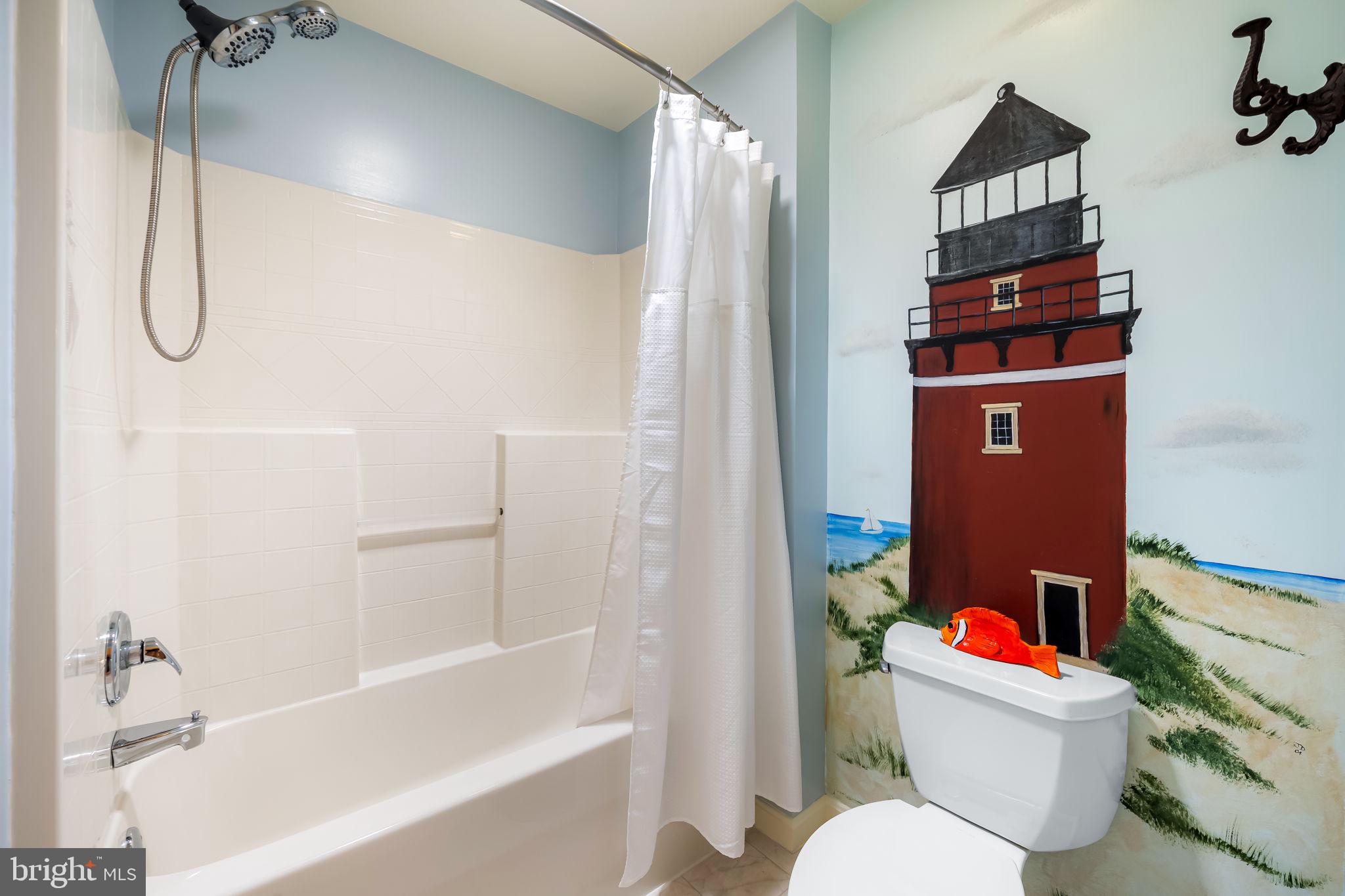 6815 Cherry Tree Court New Market, MD 21774 - Photo 40 of 86 a bathroom with a toilet and a shower