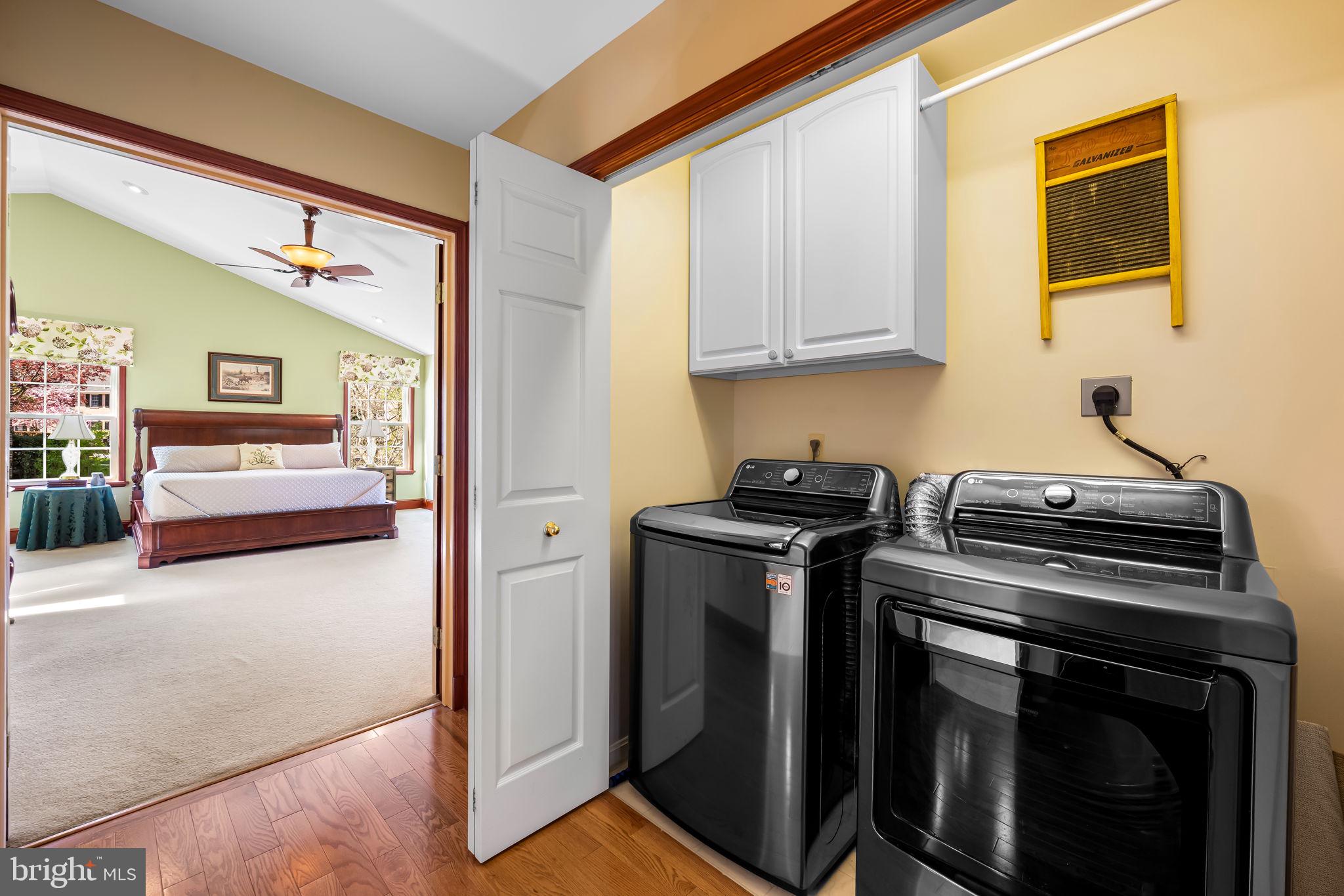 6815 Cherry Tree Court New Market, MD 21774 - Photo 41 of 86 a kitchen with stainless steel appliances granite countertop a stove and a refrigerator