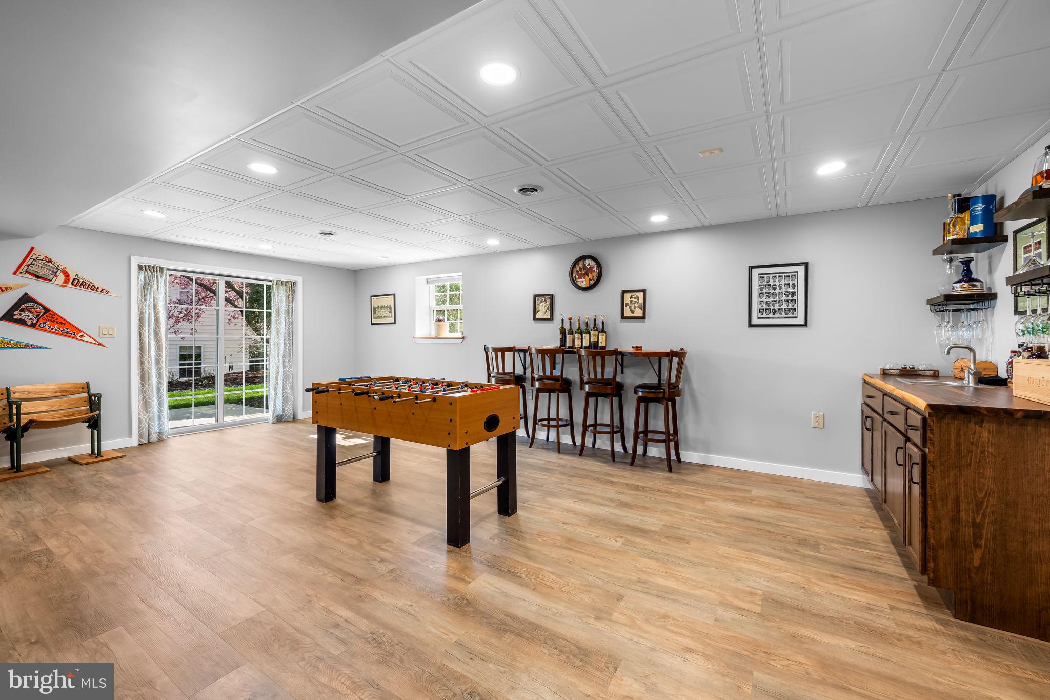 6815 Cherry Tree Court New Market, MD 21774 - Photo 53 of 86 a living room with furniture and a wooden floor
