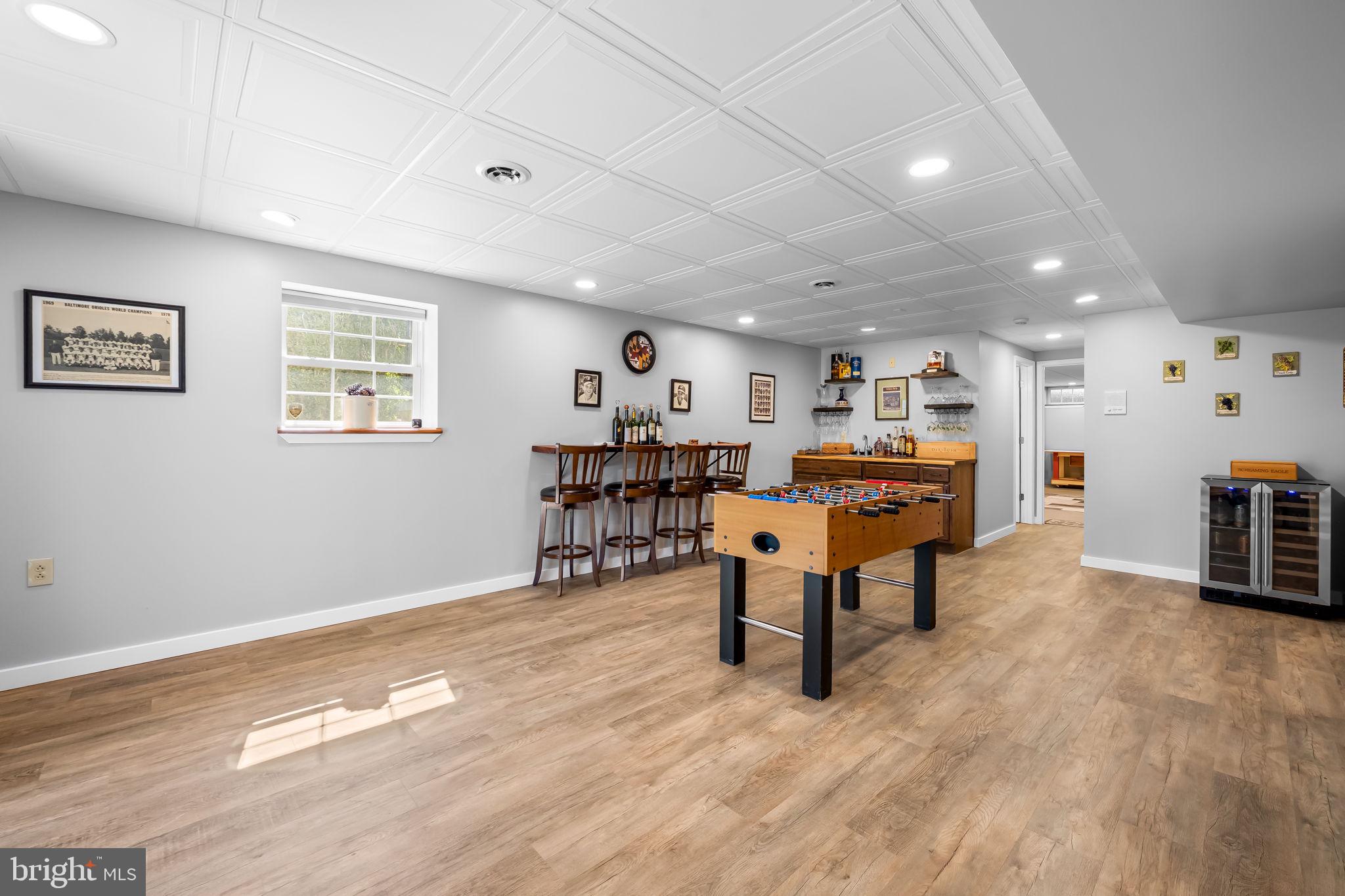 6815 Cherry Tree Court New Market, MD 21774 - Photo 55 of 86 a living room with furniture and a wooden floor