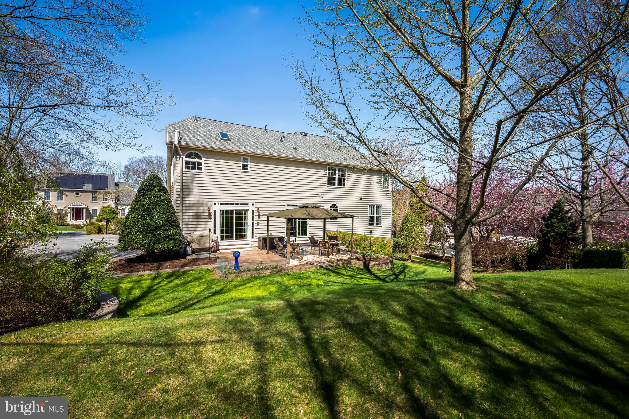 6815 Cherry Tree Court New Market, MD 21774 - Photo 65 of 86 a view of a house with a yard and sitting area