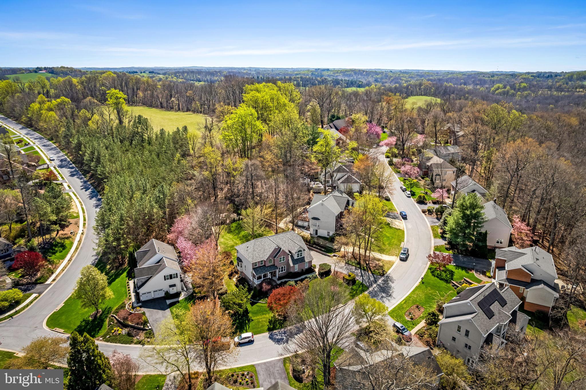 6815 Cherry Tree Court New Market, MD 21774 - Photo 74 of 86 an aerial view of lake and residential houses with outdoor space