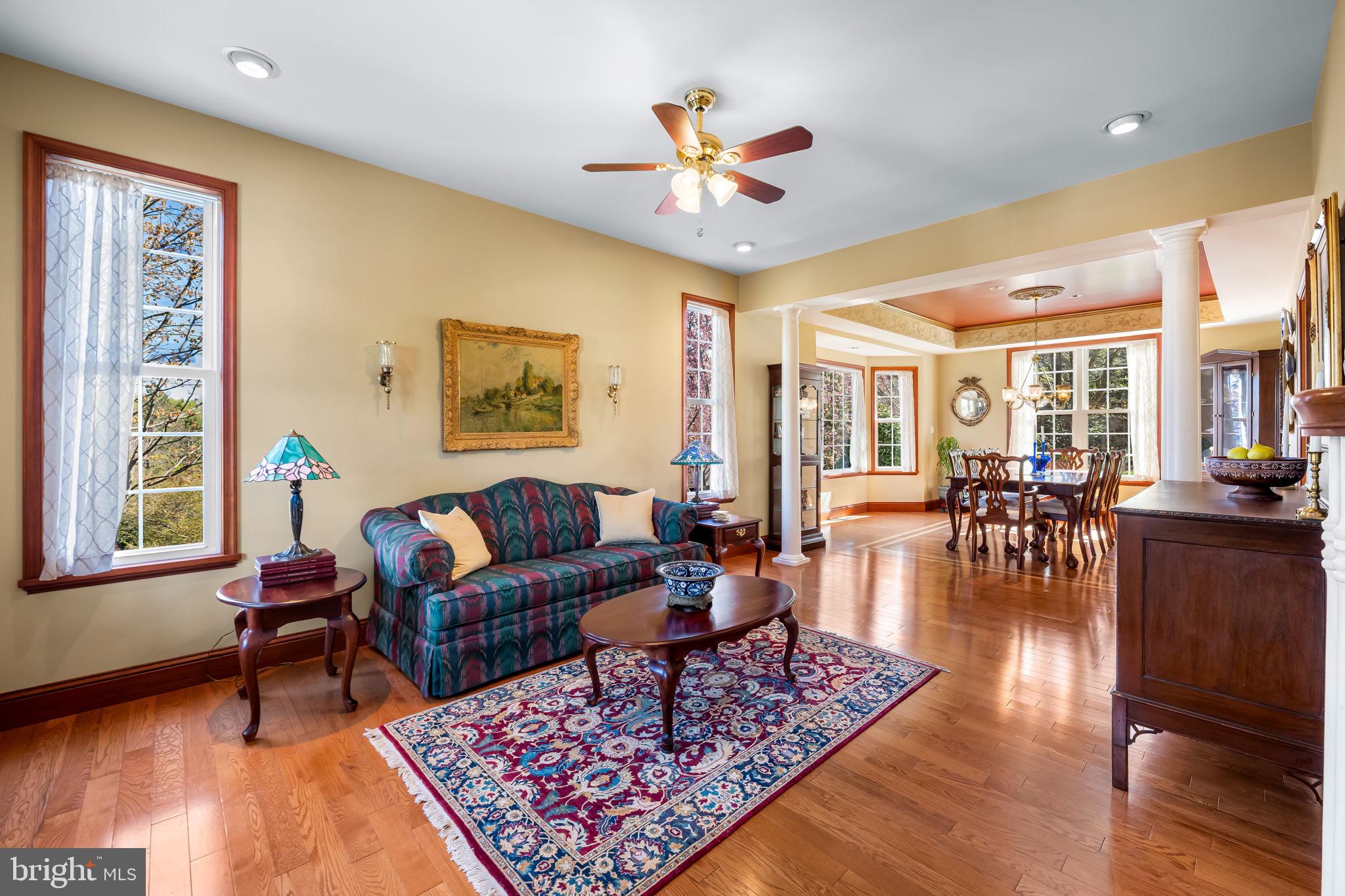 6815 Cherry Tree Court New Market, MD 21774 - Photo 9 of 86 a living room with furniture and a large window