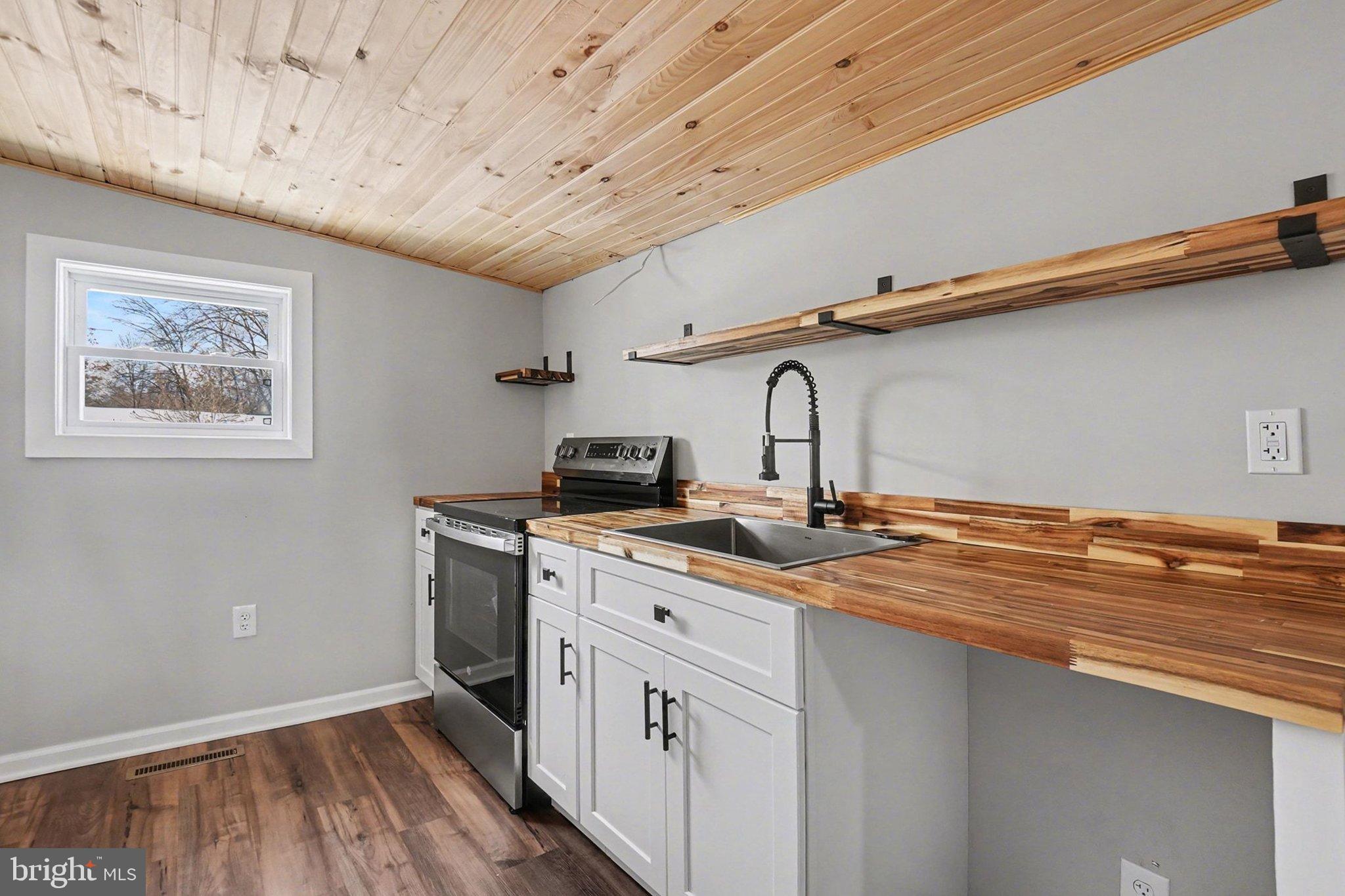 7 Groy Avenue Lebanon, PA 17046 - Photo 12 of 33 a kitchen with cabinets a sink and appliances