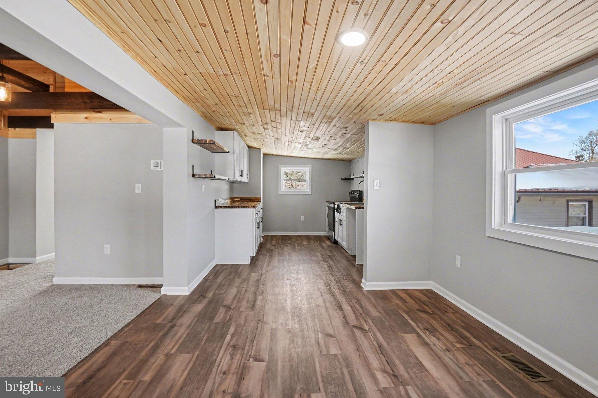 7 Groy Avenue Lebanon, PA 17046 - Photo 10 of 33 a view of a livingroom with wooden floor and staircase