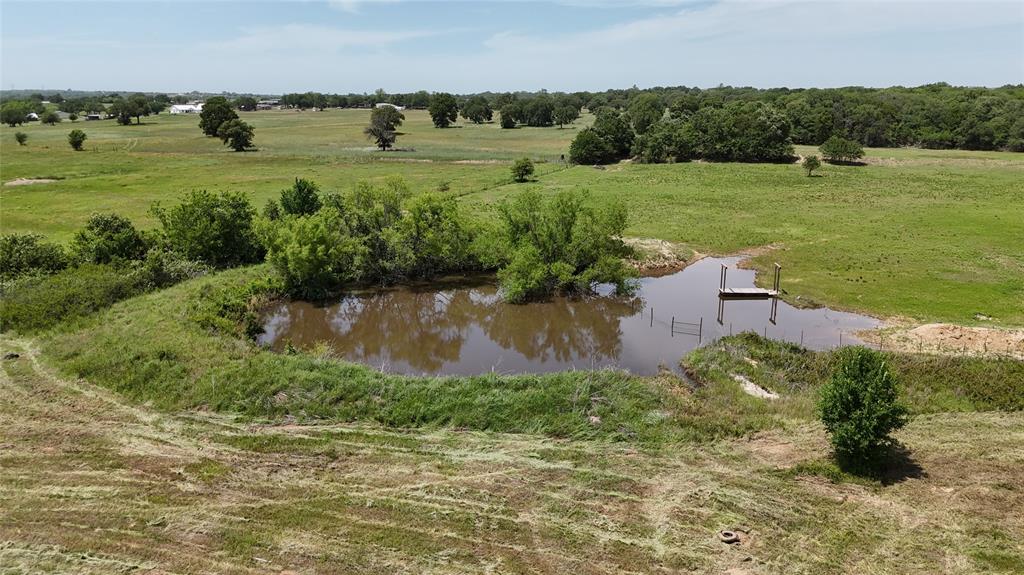 8605 West Highway 199, Unit C Springtown, TX 76082 - Photo 10 of 23 an aerial view of a houses with outdoor space and trees all around