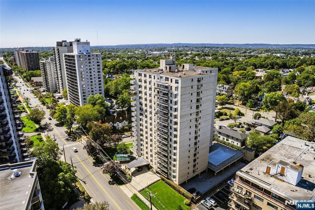 307 Prospect Avenue, Unit 14D Hackensack, NJ 07601 - Photo 1 of 18 a view of city with tall buildings