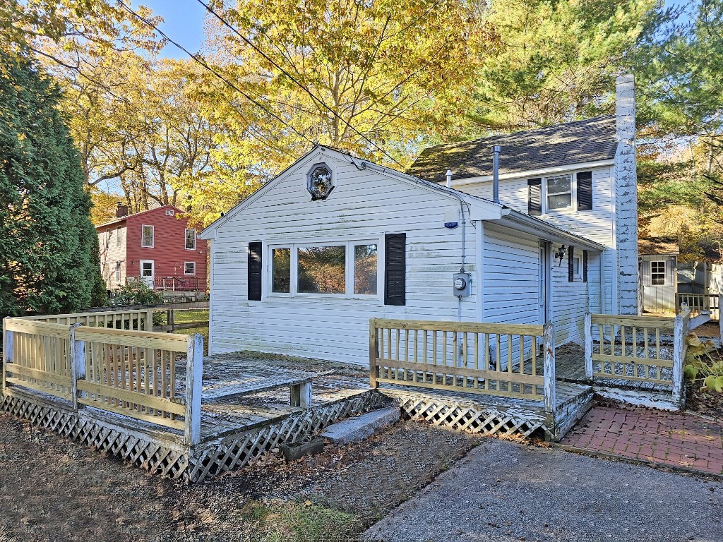 94 Clark Road Spencer, MA 01562 - Photo 1 of 17 a front view of a house with a garden