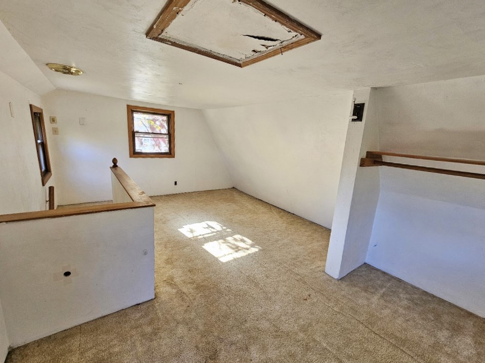 94 Clark Road Spencer, MA 01562 - Photo 16 of 17 a view of an empty room with windows