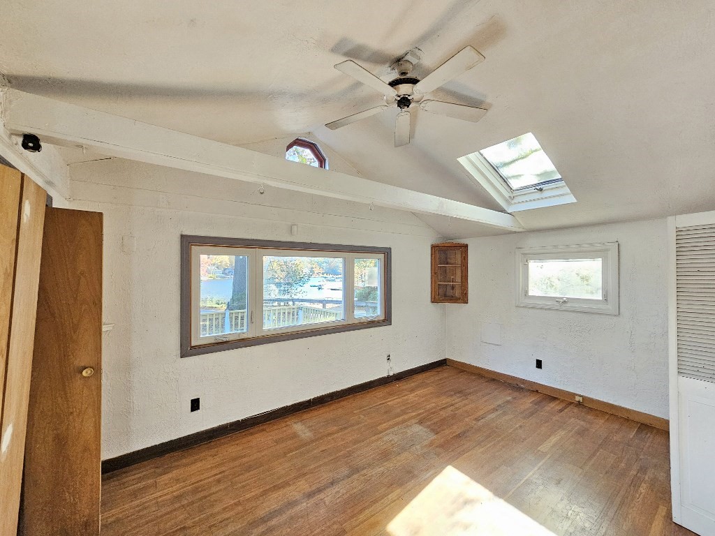 94 Clark Road Spencer, MA 01562 - Photo 5 of 17 a view of empty room with wooden floor and fan