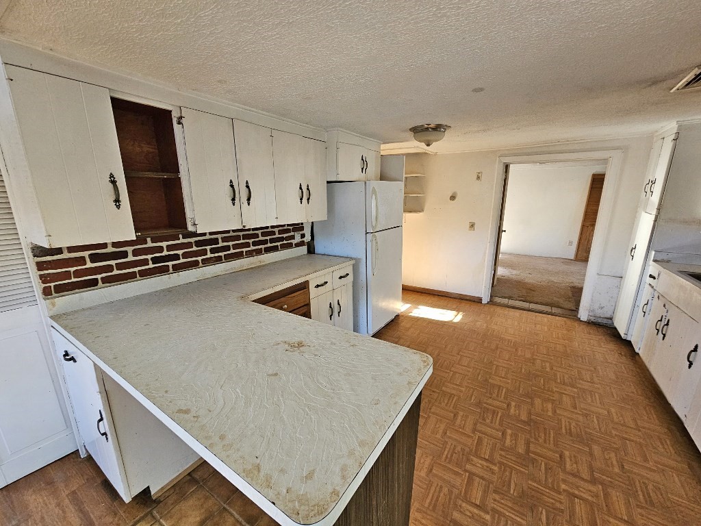 94 Clark Road Spencer, MA 01562 - Photo 8 of 17 a view of a kitchen with utility area