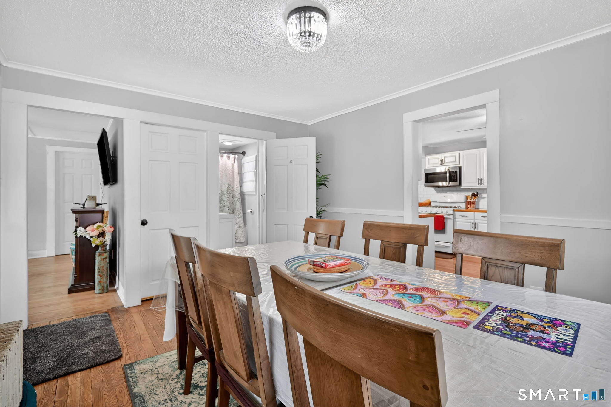 124 Prospect Street Vernon, CT 06066 - Photo 11 of 31 a dining room with furniture and a table