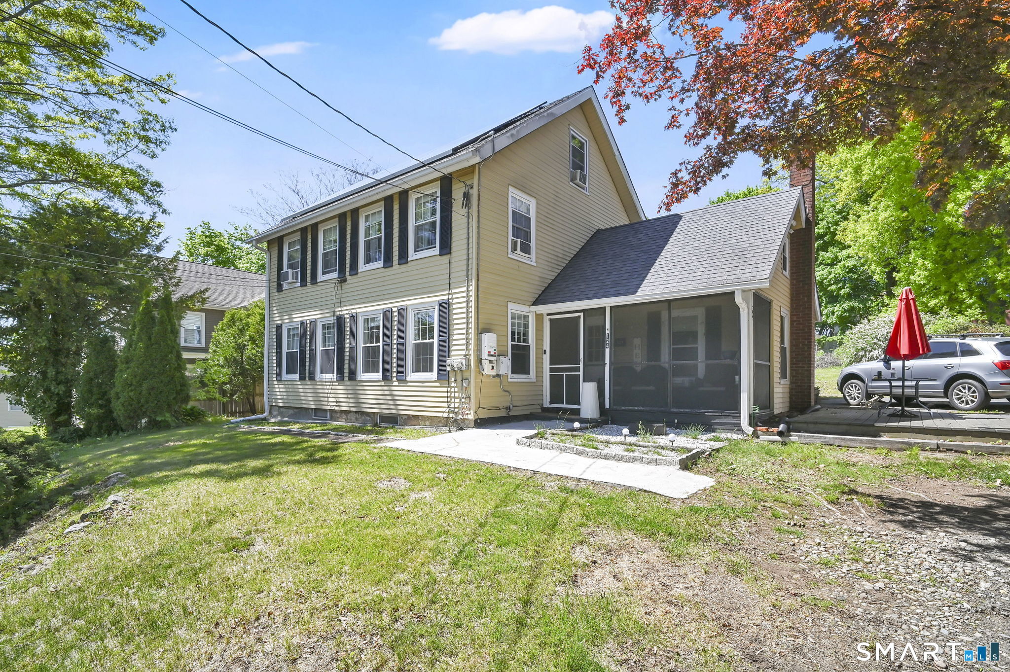 124 Prospect Street Vernon, CT 06066 - Photo 2 of 31 a front view of a house with a yard and garage