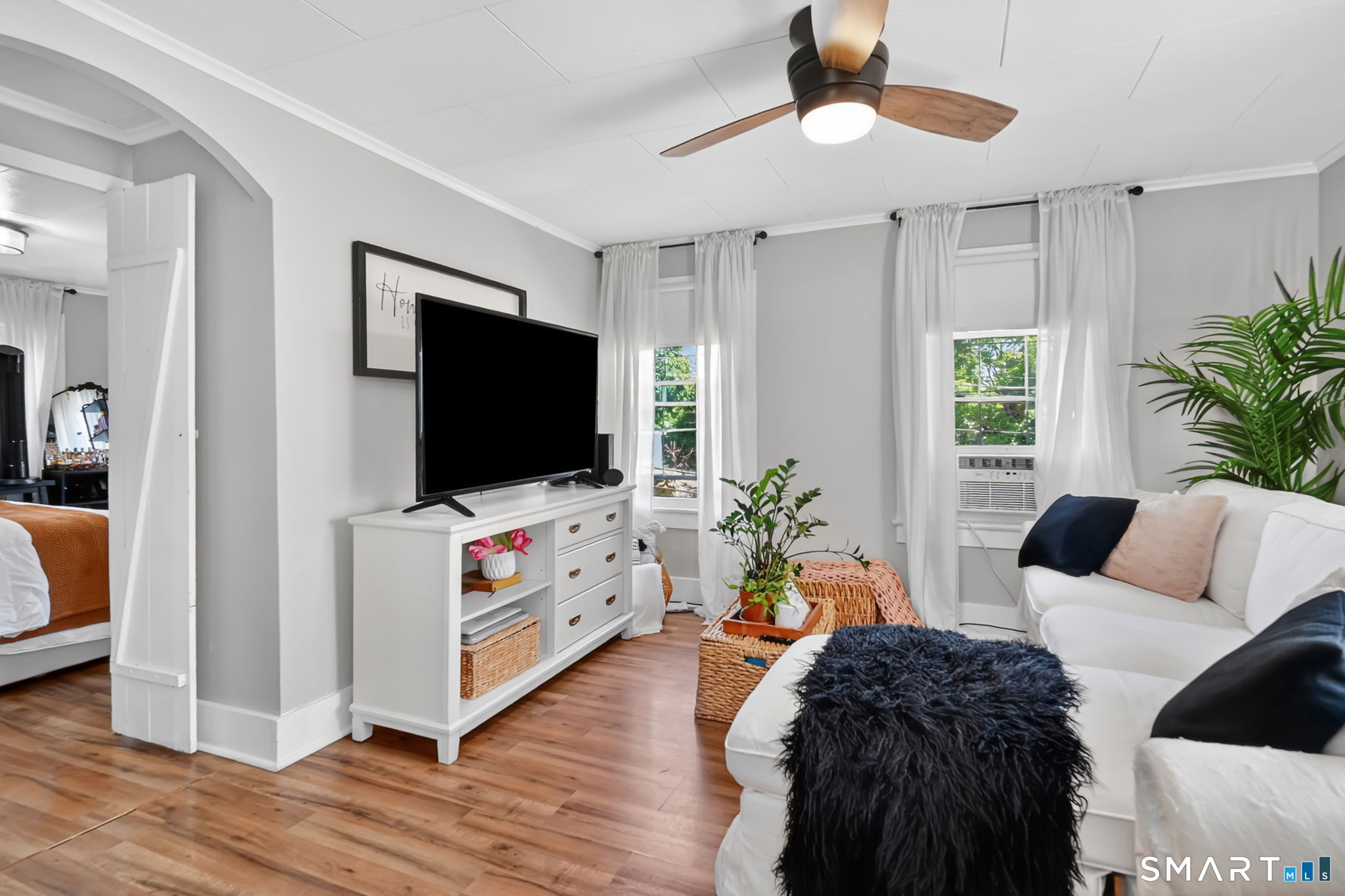 124 Prospect Street Vernon, CT 06066 - Photo 21 of 31 a living room with furniture and a flat screen tv