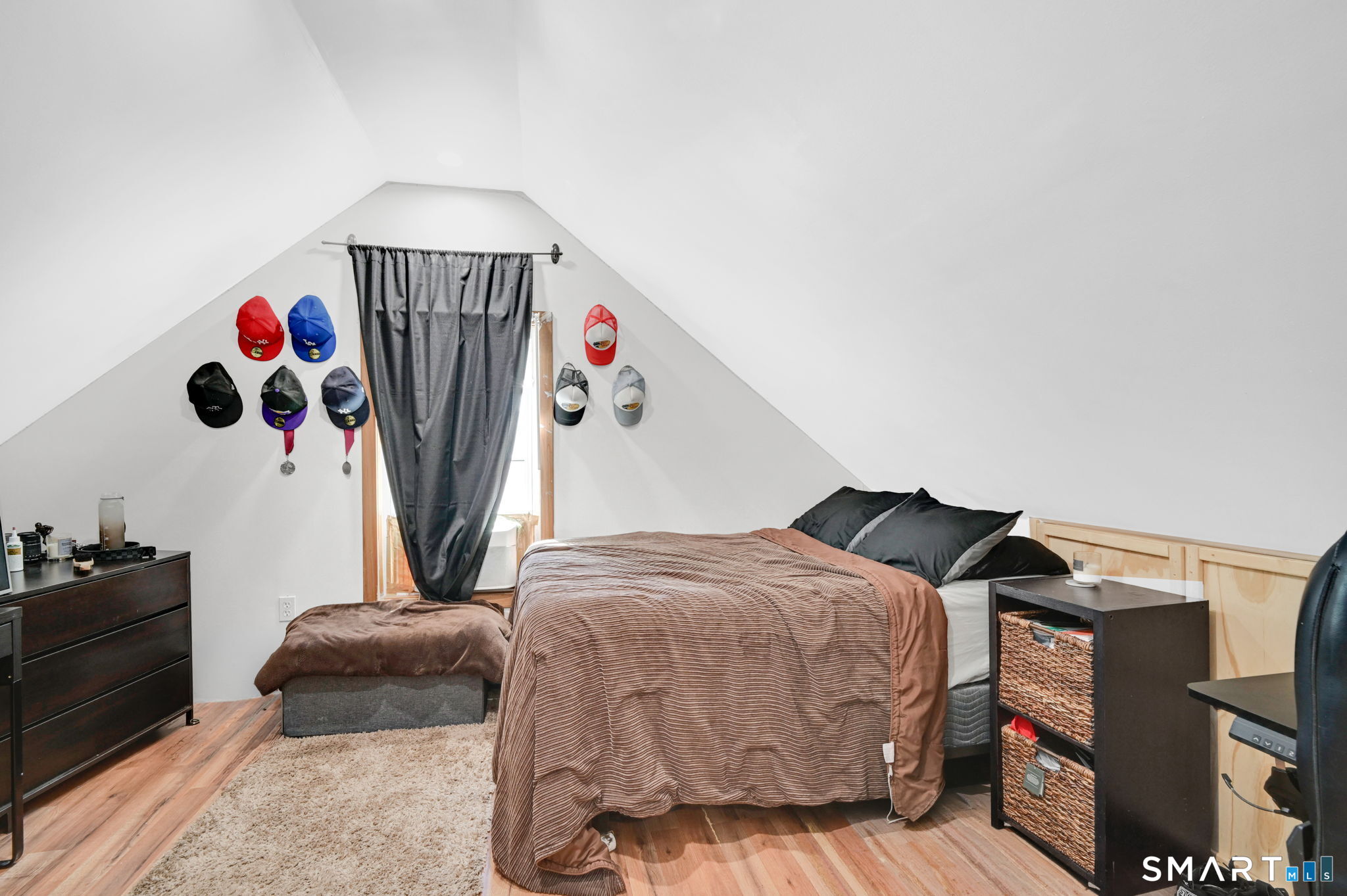 124 Prospect Street Vernon, CT 06066 - Photo 25 of 31 a bedroom with a bed and a window
