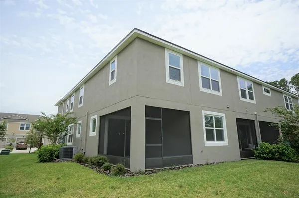 a front view of house with a yard