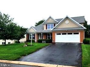 2041 Harrogate Road Lancaster, PA 17601 - Photo 43 of 46 a front view of a house with a yard and garage