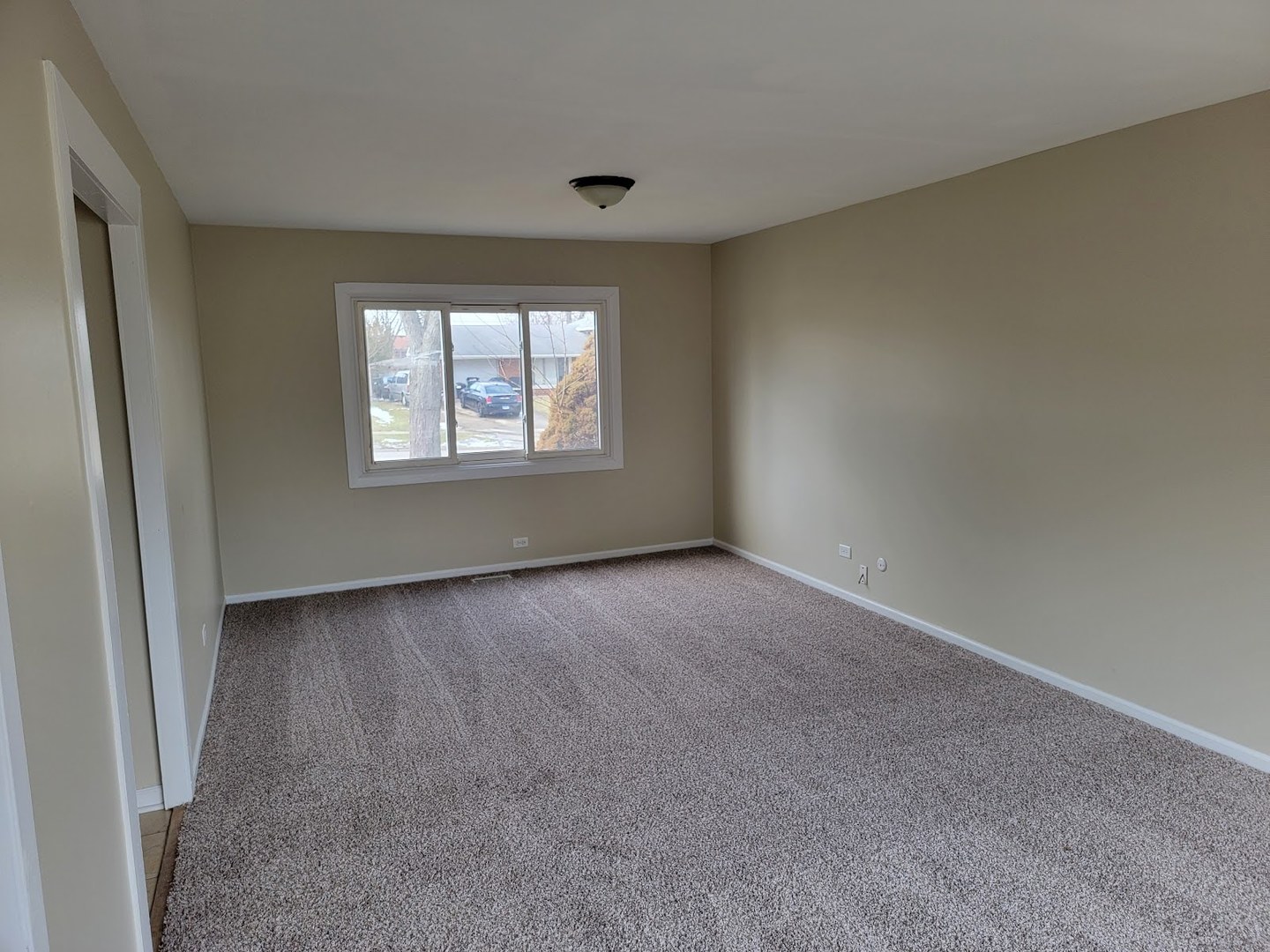 1935 Ashley Road Hoffman Estates, IL 60169 - Photo 15 of 28 an empty room with a window