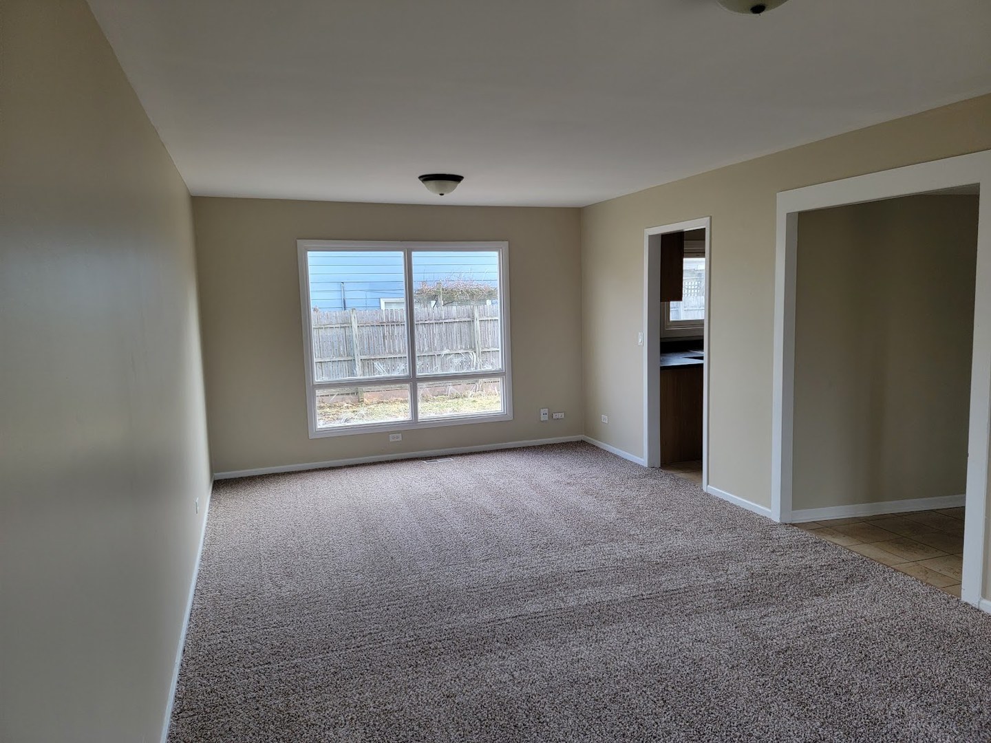 1935 Ashley Road Hoffman Estates, IL 60169 - Photo 16 of 28 an empty room with windows and closet