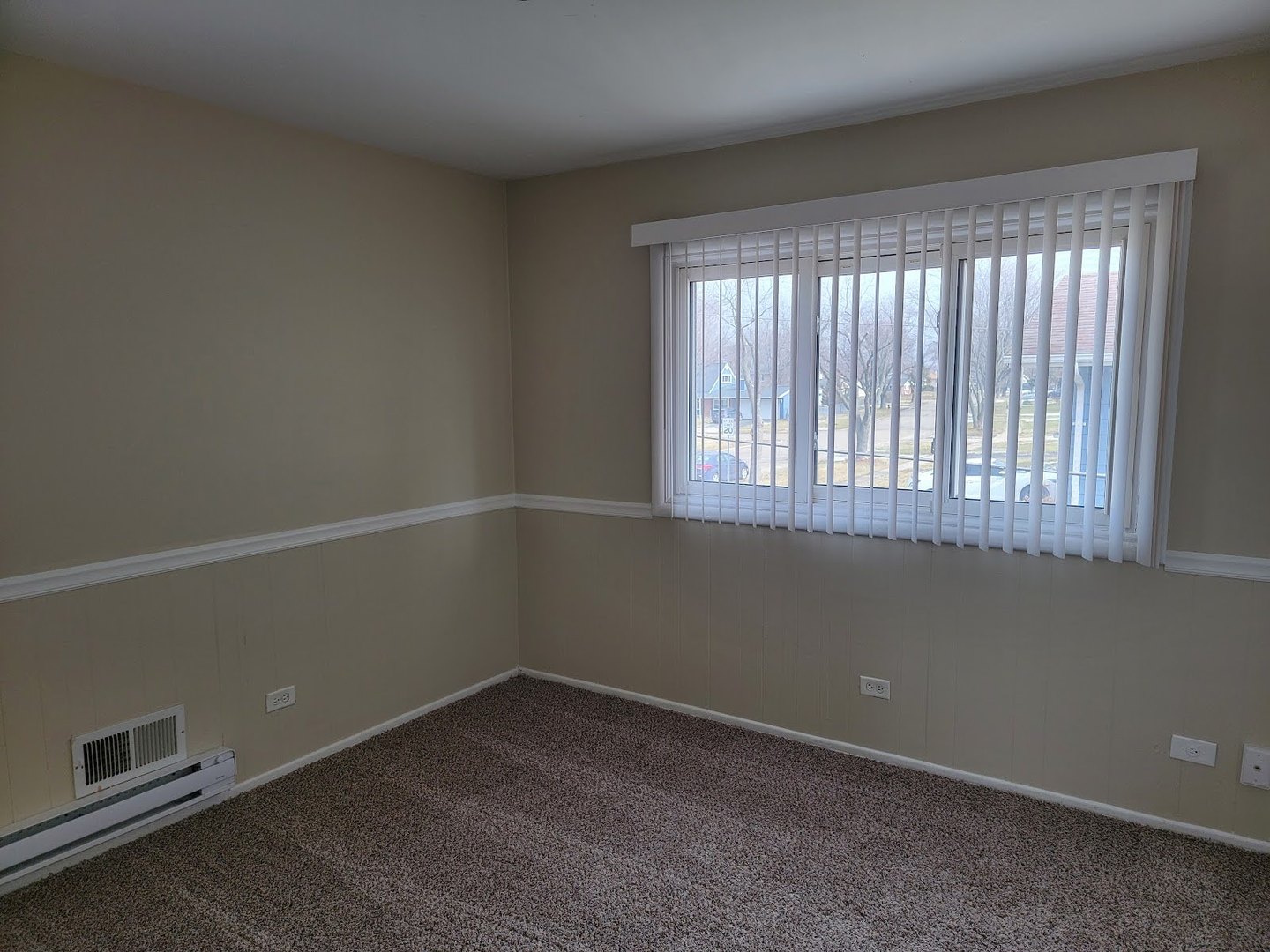 1935 Ashley Road Hoffman Estates, IL 60169 - Photo 25 of 28 an empty room with a window
