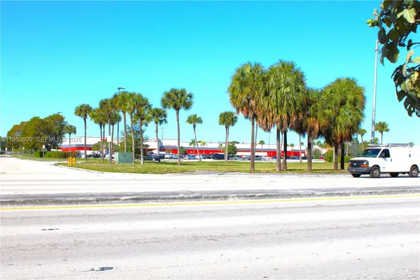 a view of a table and chairs in the roof deck